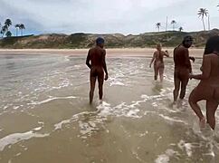 Friends intensely fuck on the beach while admiring nature's beauty.