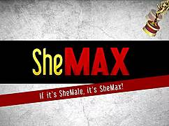 asian ladyboy in red stockings strokes hairy she-dick on the bed