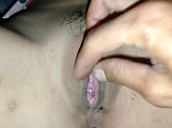 Pounding a shaved tight pussy until it squirts.