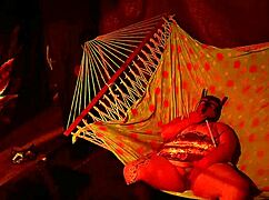 getting frisky in a tent, fingering her wet hole in a hammock...