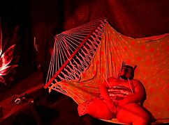 getting frisky in a tent, fingering her wet hole in a hammock...