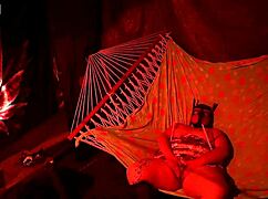 getting frisky in a tent, fingering her wet hole in a hammock...