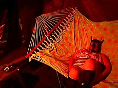 getting frisky in a tent, fingering her wet hole in a hammock...