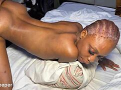 Eyes wide open as the large penis enters the petite body