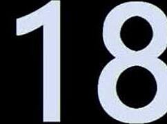 Dark-haired brunette displays big nipples on ottoman