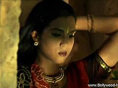 seductive mature brunette performs solo striptease undressing with clothes ripped