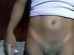 A horny Kenyan crossdresser strips down. He fingers his gaping asshole.