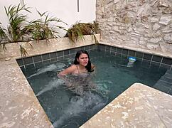 two hot lesbians masturbating in a public pool, scared of getting caught.