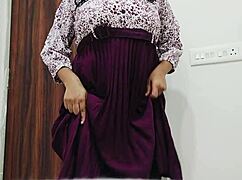 College girl explores a big eggplant in homemade creamy activity