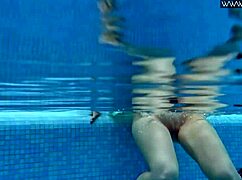 Lizi Vogue Swims Underwater in Pool with Friends