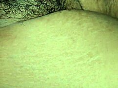 an indian girl shares a tender moment with her young dad in a homemade setting