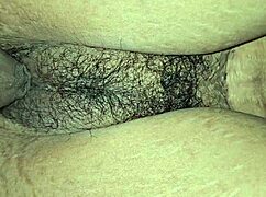 an indian girl shares a tender moment with her young dad in a homemade setting