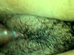 an indian girl shares a tender moment with her young dad in a homemade setting