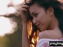 petite filipina kit rysha strips and poses nude in the wildflower field