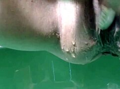 Russian woman performs a solo show with toys and fluids