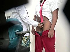 lady doctor tenderly checking school student's dick