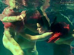 feeling the intense passion underwater with lilia mihalkova and natalia kupalka in the pool