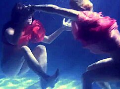 feeling the intense passion underwater with lilia mihalkova and natalia kupalka in the pool