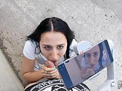 Young brunette demonstrates blowjob skills on huge cock, swallowing cum in pov