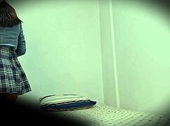 A hidden cam captures a beautiful colombian model in public.