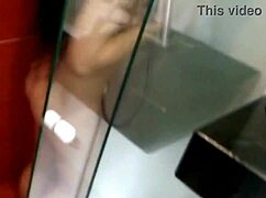 latina milf bathes under shower, showing natural huge tits