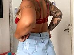 Redhead solo flashes trimmed pussy under skirt