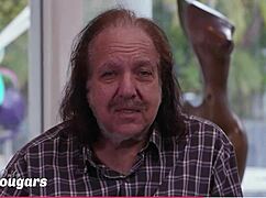 Stripper Mischa Brooks performs on stage.