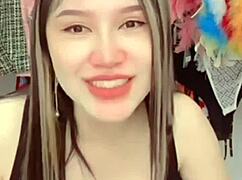 A teen with large breasts in a sexy pose