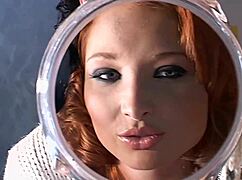 after double penetration, this redhead gets bukkake on her face