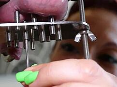 Lady Morgana performs extreme foot fisting on the slave