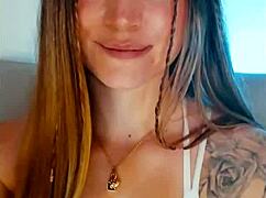 tattooed babe going crazy on webcam