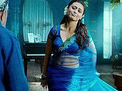 Rani Mukharji slips out of her saree, flashing panty glimpses and curvy ass cheeks in tight view.