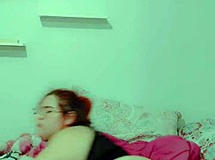 hot redhead fingers her wet pussy in solo bliss