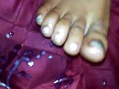 Ebony Delivers Steamy Foot Job Cumshot