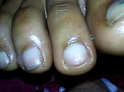 Ebony Delivers Steamy Foot Job Cumshot