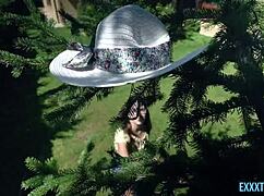 Bathtub bubbles surround Sara Bell and Raul Costa relaxing together