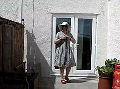 think you can handle watching this naughty housewife strip naked outdoors?