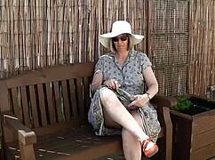 think you can handle watching this naughty housewife strip naked outdoors?