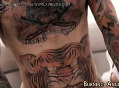 This kinky goth punk slut with small tits and tattoos begs for a messy facial after fingering