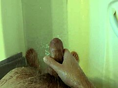 she strokes her wet body in the shower till orgasm hits