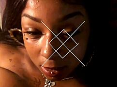 oiled black amateurs grind huge bbc between slick tits to thumping music beats in homemade titfuck video that pulses with raw energy