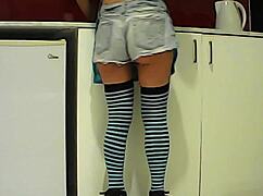 latina brunette grabs banana in kitchen then drops to suck big cock hungrily