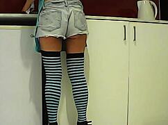 latina brunette grabs banana in kitchen then drops to suck big cock hungrily