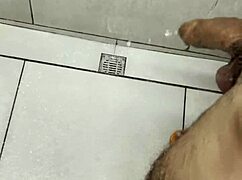 i'm stroking my cock so hard in the gym bathroom