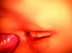 check out this cute fuck doll's big shaved pussy taking double toy anal close-up