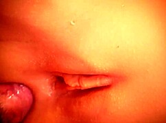 check out this cute fuck doll's big shaved pussy taking double toy anal close-up