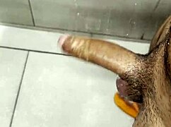 i'm stroking my cock so hard in the gym bathroom