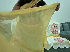 desi saree aunty lifts fabric to flash her full tits teasingly