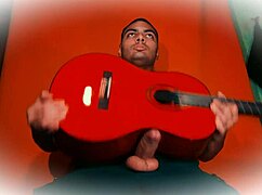 check this sexy bodybuilder stroking his huge 18cm cock guitar-style till he cums