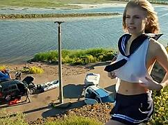 SPUNKY BLONDE TEEN MODEL STRIPS NAKED OUTDOORS IN MINISKIRT